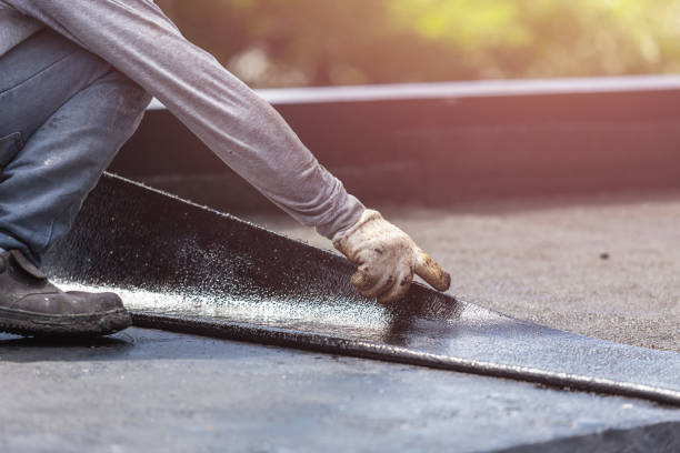 Professional Basement Waterproofing technician working in Lansing, MI